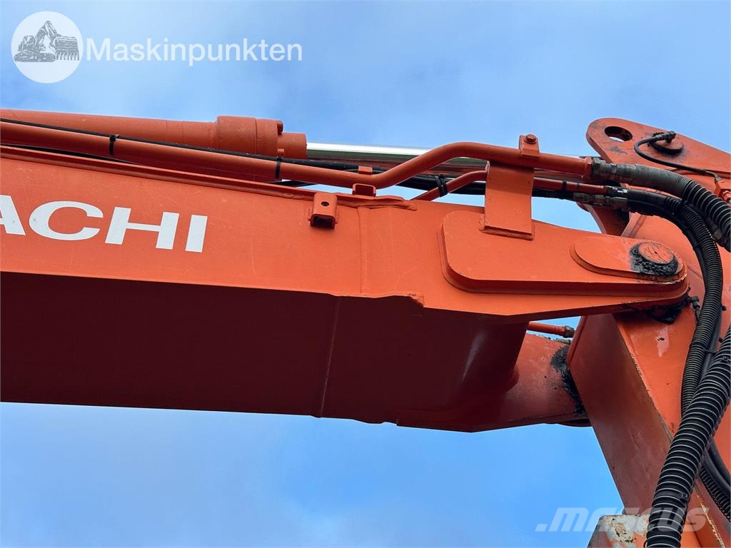 Hitachi ZX135US-5B Bandgrävare