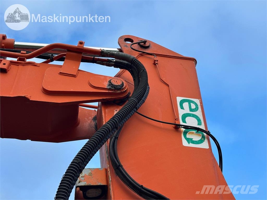 Hitachi ZX135US-5B Bandgrävare