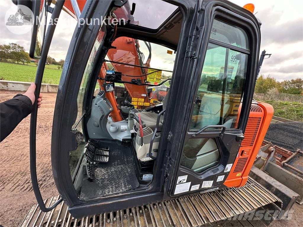 Hitachi ZX135US-5B Bandgrävare