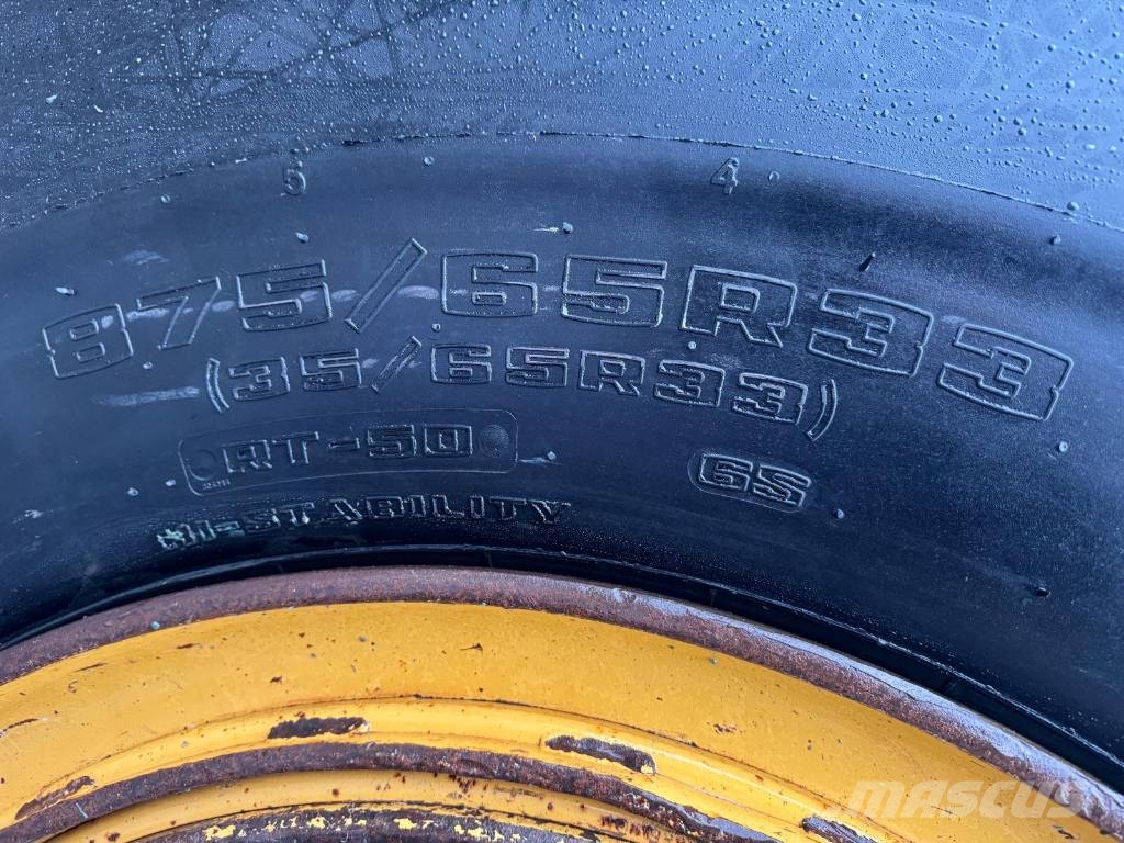 CAT 988 H لوادر بعجل