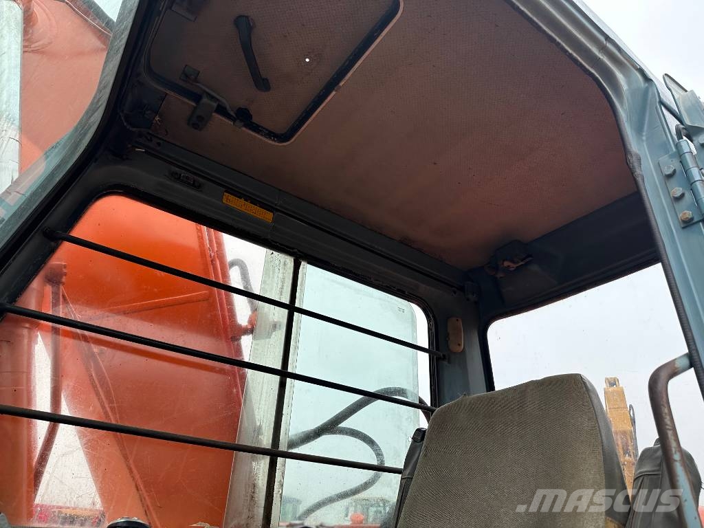 Hitachi EX 120 Gravemaskiner på larvebånd