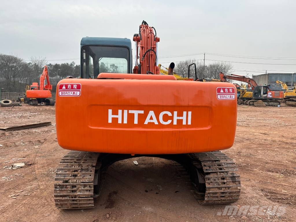 Hitachi EX 120 Gravemaskiner på larvebånd