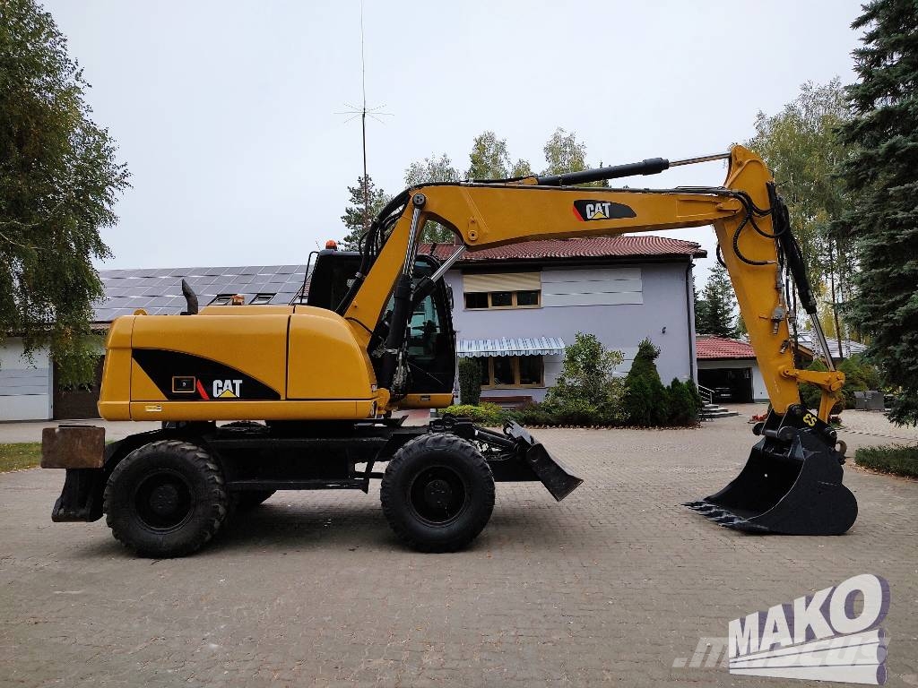 CAT M 313 D Wielgraafmachines