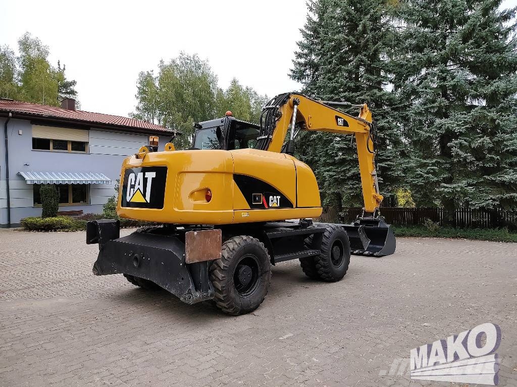 CAT M 313 D Wielgraafmachines