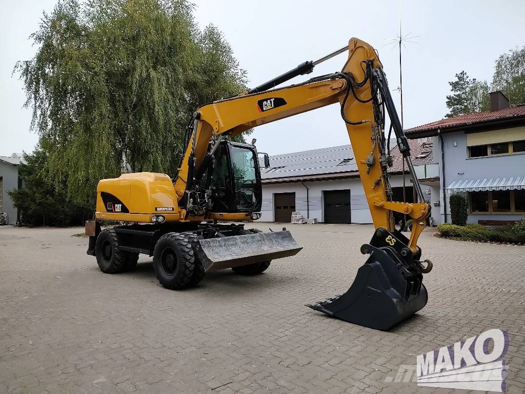 CAT M 313 D Wielgraafmachines