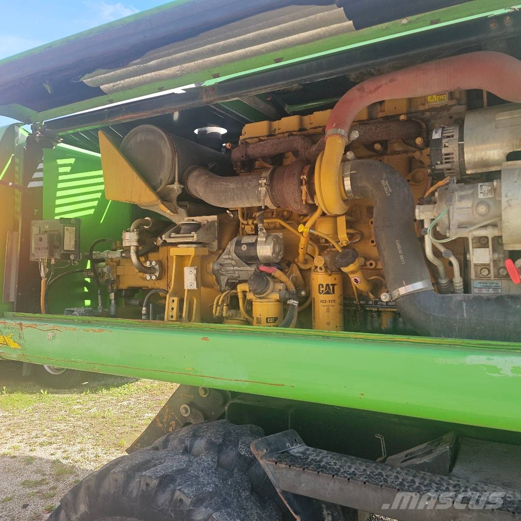 CAT 318 D حفارات بعجل