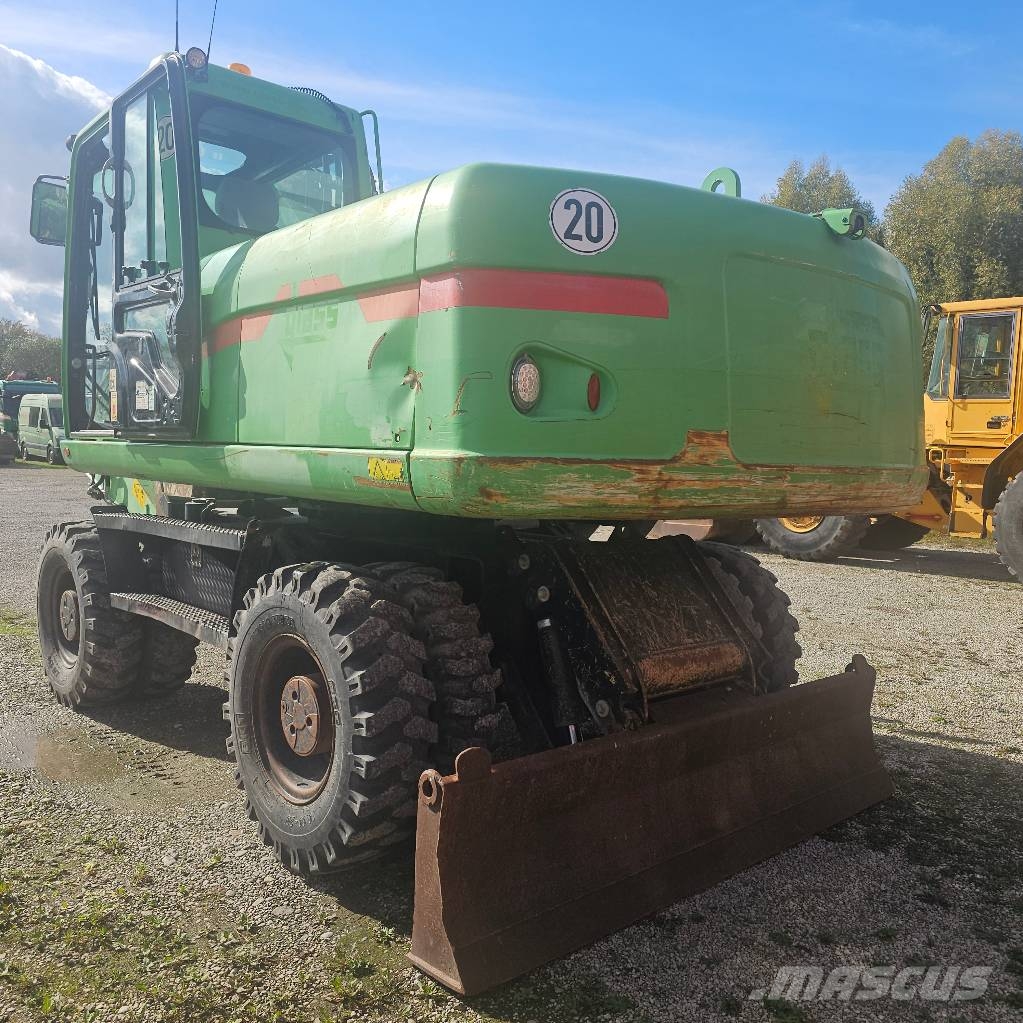 CAT 318 D حفارات بعجل