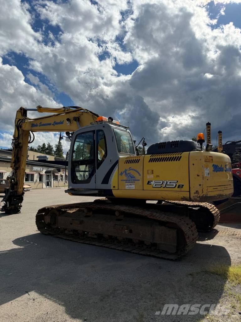 New Holland E 215 B حفارات زحافة