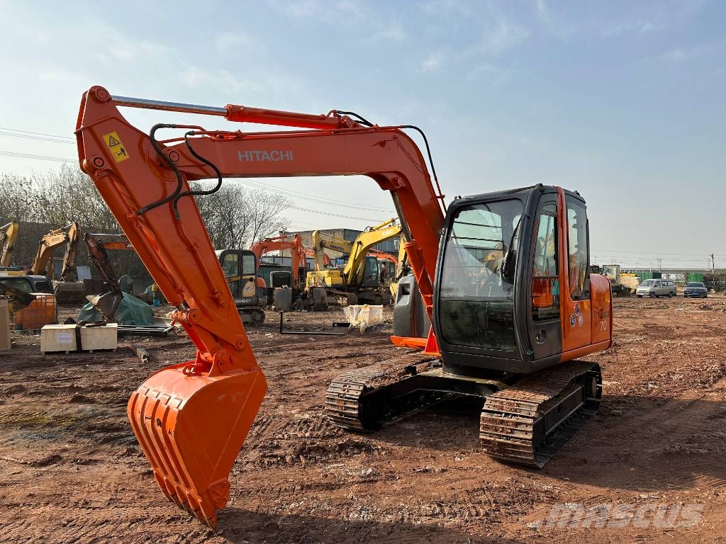 Hitachi EX120 Gravemaskiner på larvebånd