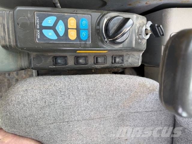 New Holland E 70 SR Midigraafmachines 7t - 12t