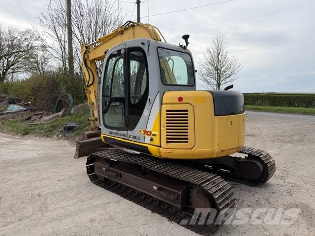 New Holland E 70 SR Midigraafmachines 7t - 12t