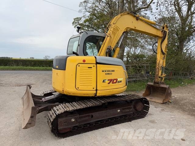 New Holland E 70 SR Midigraafmachines 7t - 12t