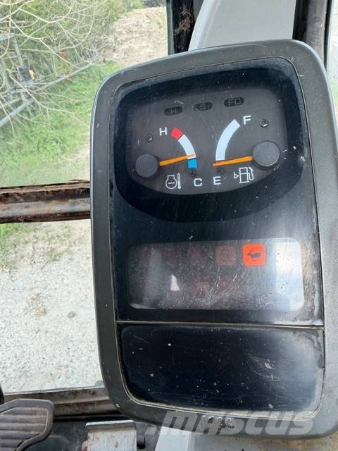 New Holland E 70 SR Midigraafmachines 7t - 12t