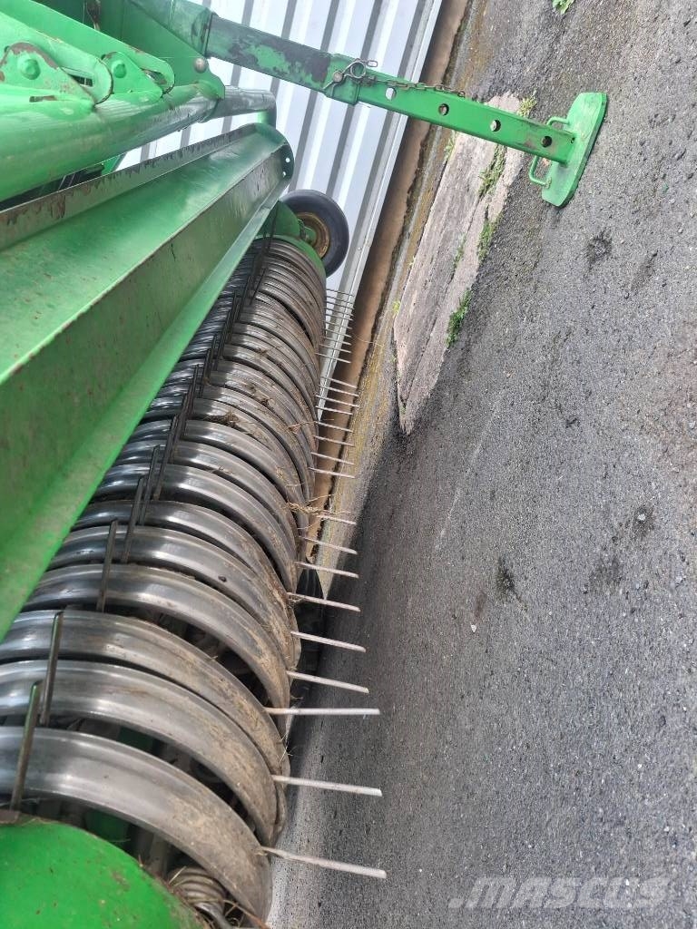 John Deere C440R مغلفات