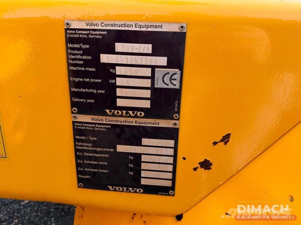 Volvo L30B Quick coupler - Folding bucket - Forks Wheel loaders