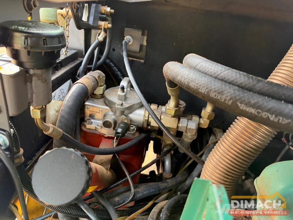 Volvo L30B Quick coupler - Folding bucket - Forks Wheel loaders