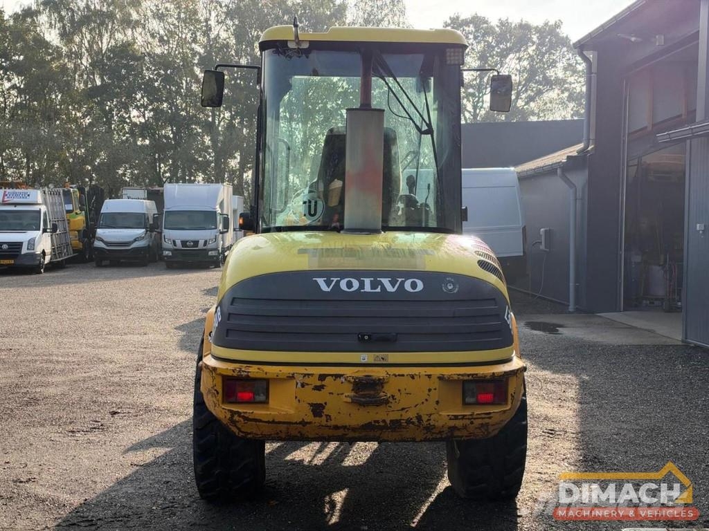 Volvo L30B Quick coupler - Folding bucket - Forks Wheel loaders