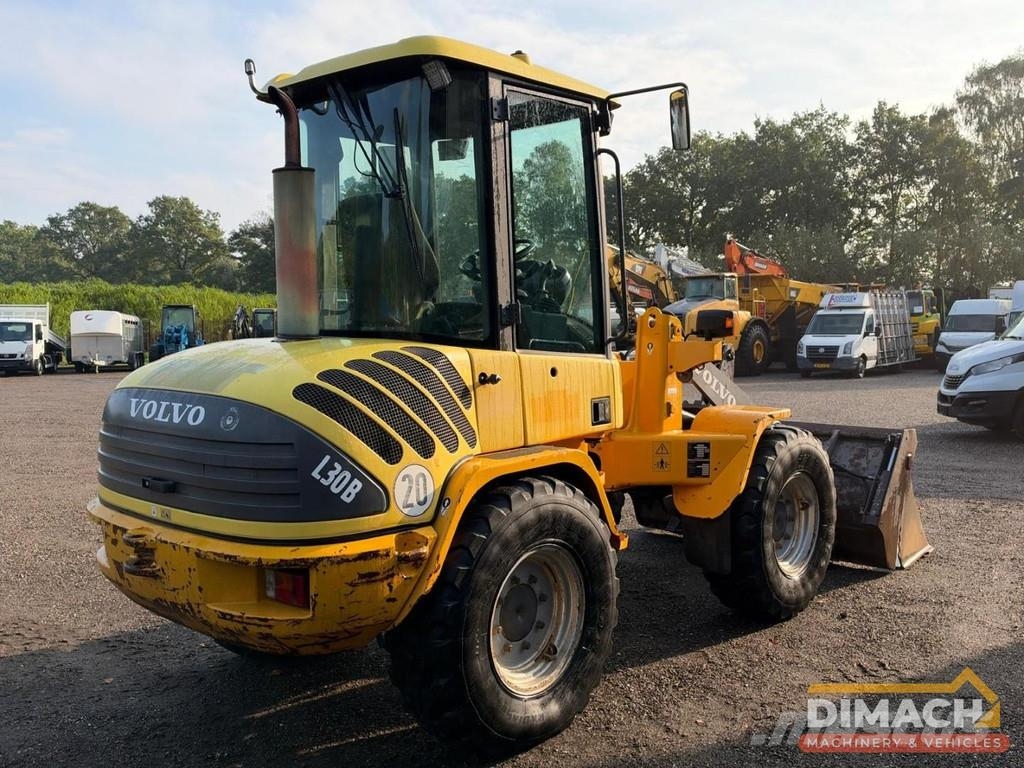 Volvo L30B Quick coupler - Folding bucket - Forks Wheel loaders