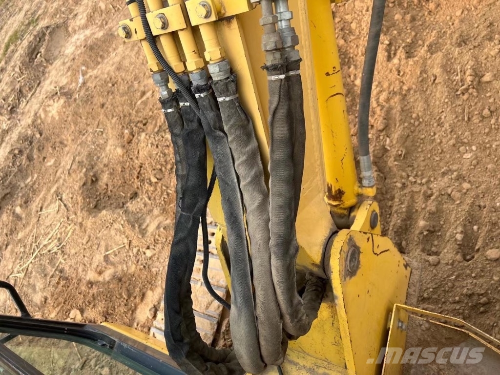Komatsu PC58 Közepes (midi) kotrók 7 t - 12 t