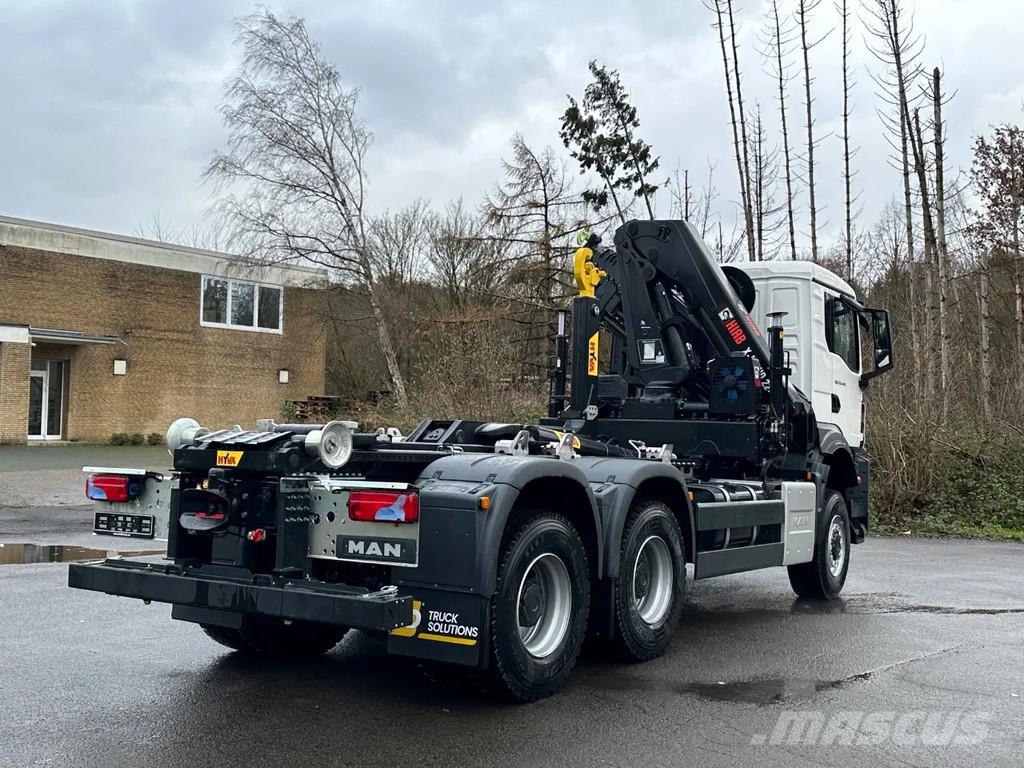 MAN TGS 33.440 MAN TGS 33.440 6x6 BB Abrollkipper+Kran Hook lift trucks