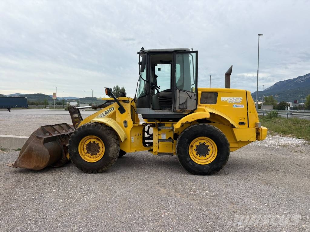 New Holland W111 Kolesni nakladalci