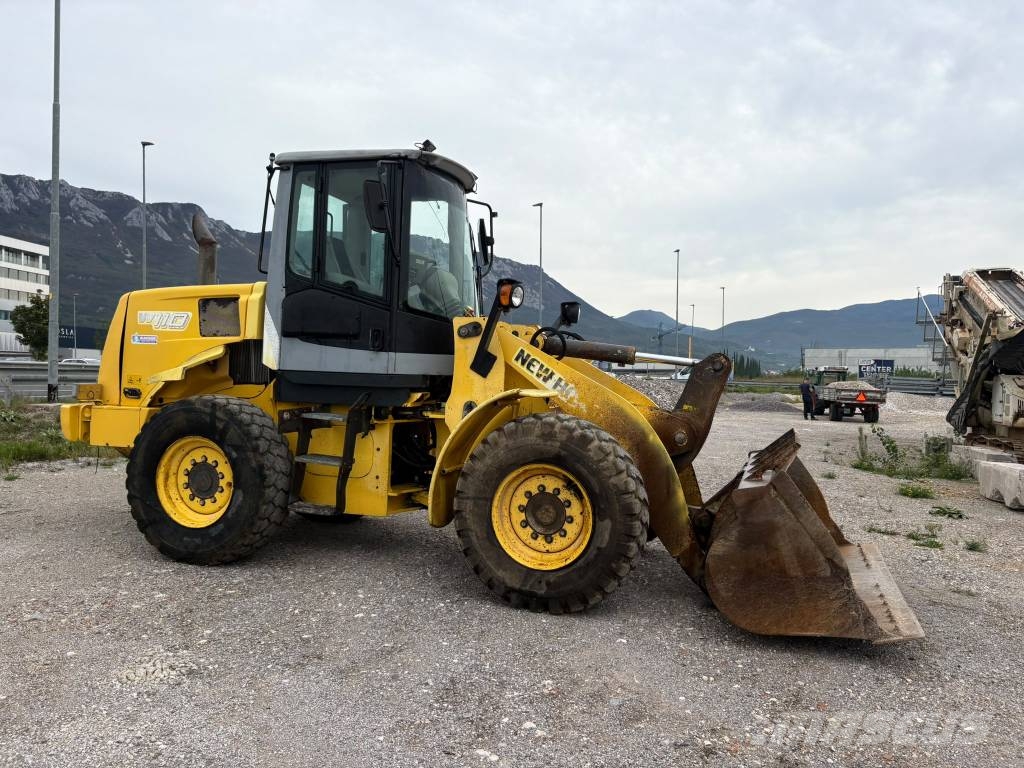New Holland W111 Kolesni nakladalci