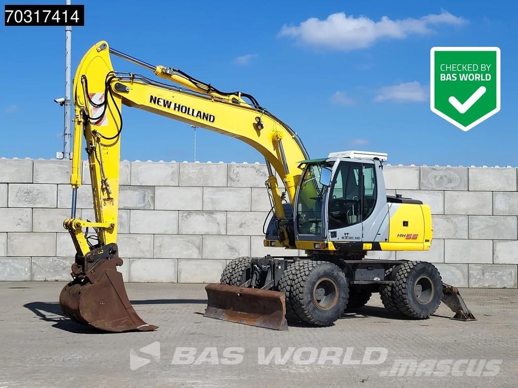 New Holland MH 5.6 Outriggers + Blade Kolesové rýpadlá