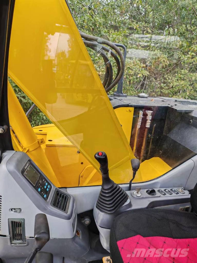Komatsu PC 128 US حفارات وسط 7 طن - 12 طن
