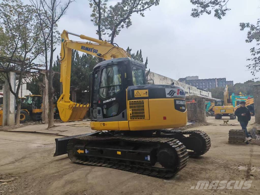 Komatsu PC 128 US حفارات وسط 7 طن - 12 طن