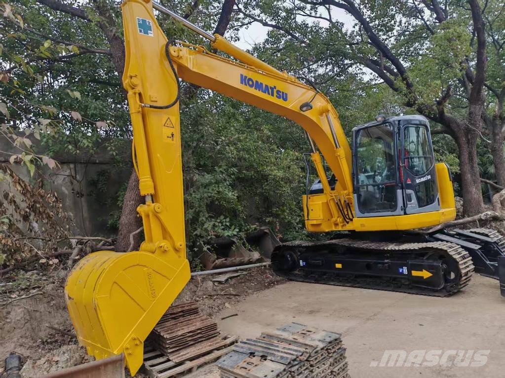 Komatsu PC 128 US حفارات وسط 7 طن - 12 طن