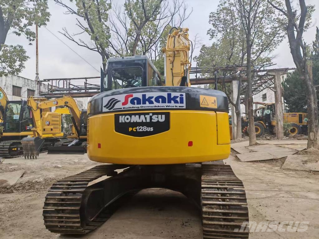 Komatsu PC 128 US حفارات وسط 7 طن - 12 طن