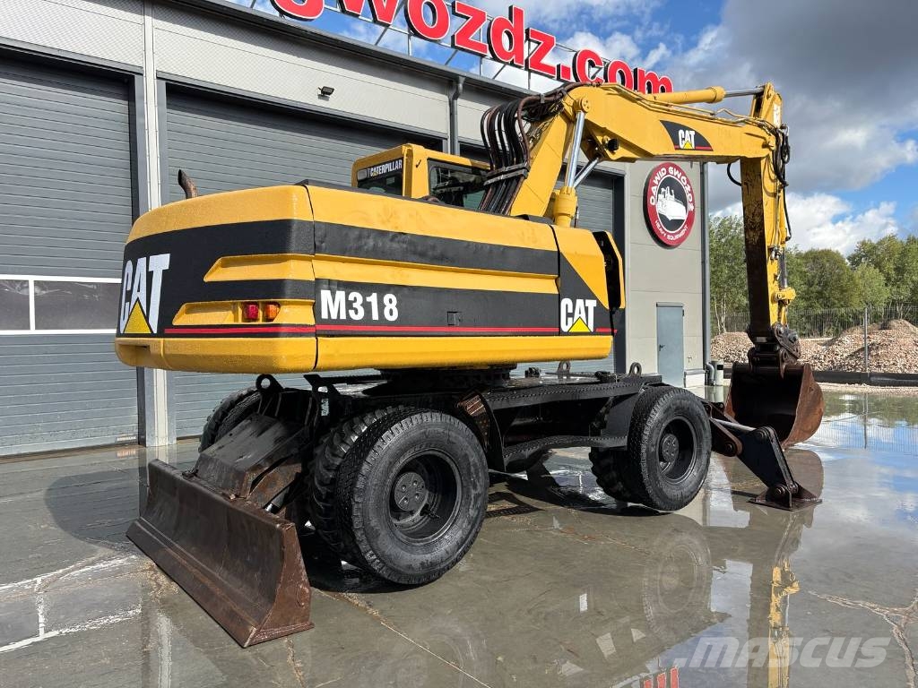CAT M 318 Wielgraafmachines