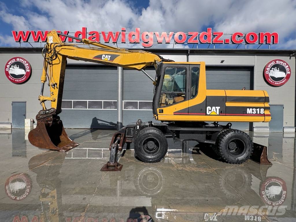 CAT M 318 Wielgraafmachines