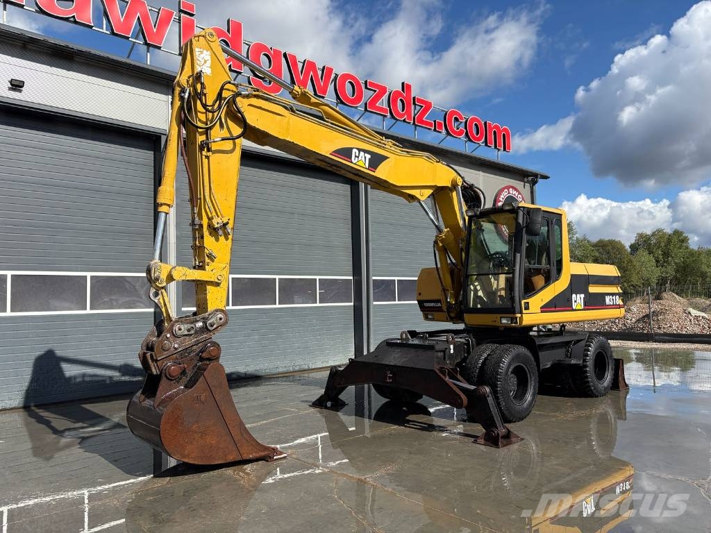 CAT M 318 Wielgraafmachines