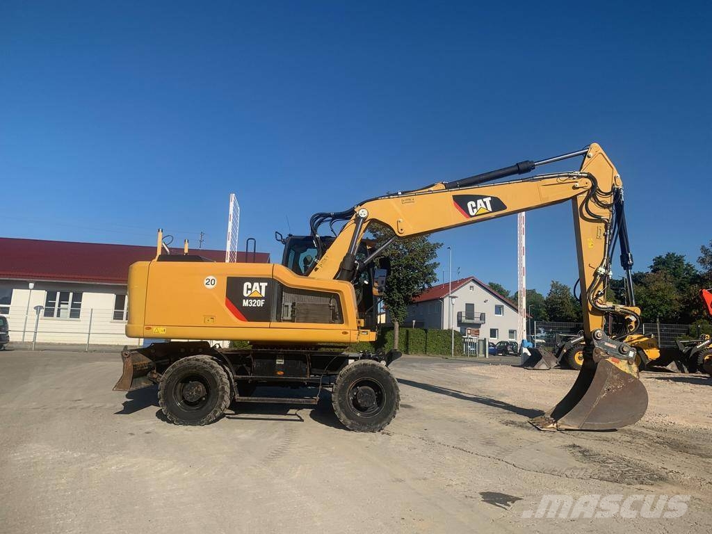 CAT M320F Wielgraafmachines