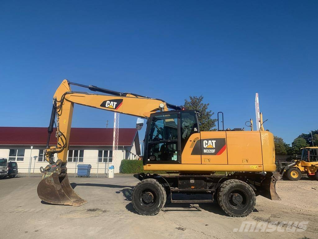 CAT M320F Wielgraafmachines