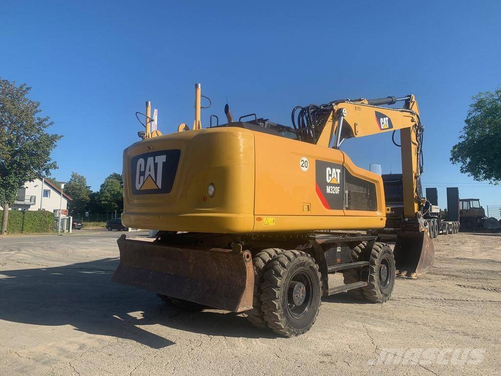 CAT M320F Wielgraafmachines