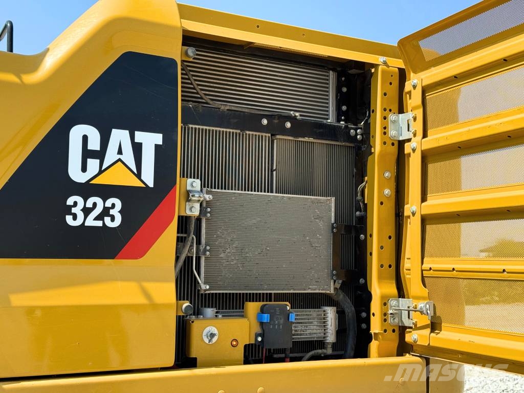 CAT 07B CAT 323 Vikšriniai ekskavatoriai