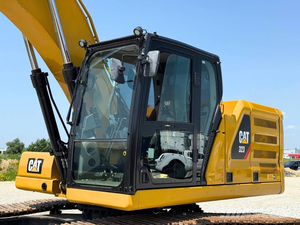 CAT 07B CAT 323 Vikšriniai ekskavatoriai