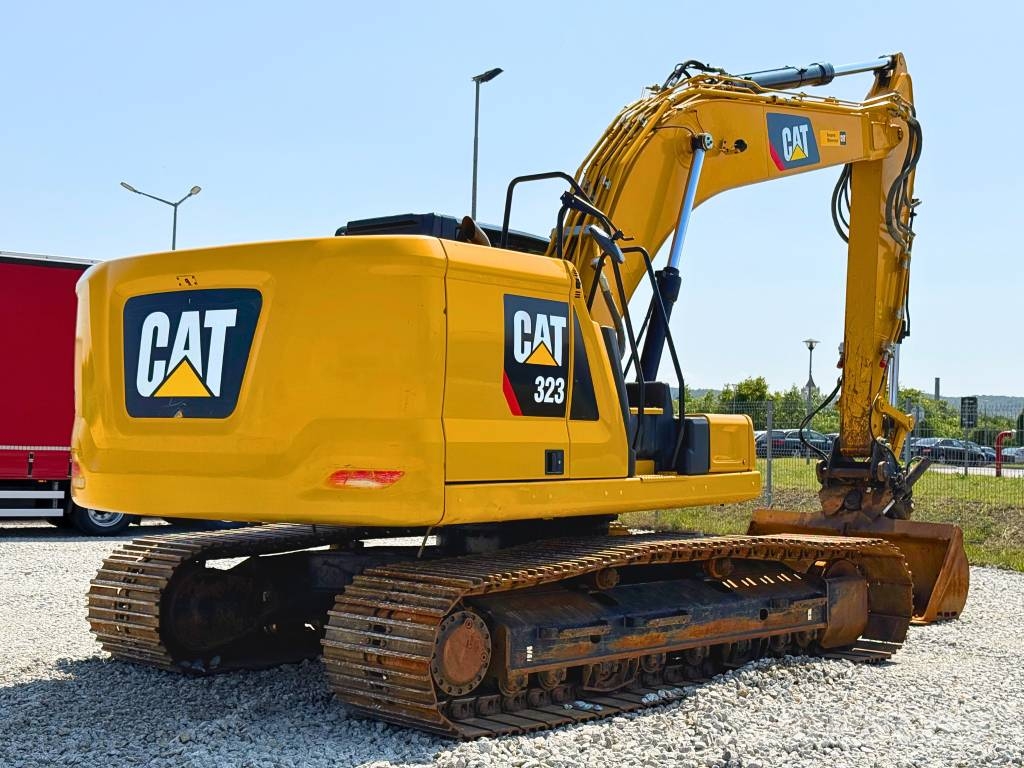 CAT 07B CAT 323 Vikšriniai ekskavatoriai