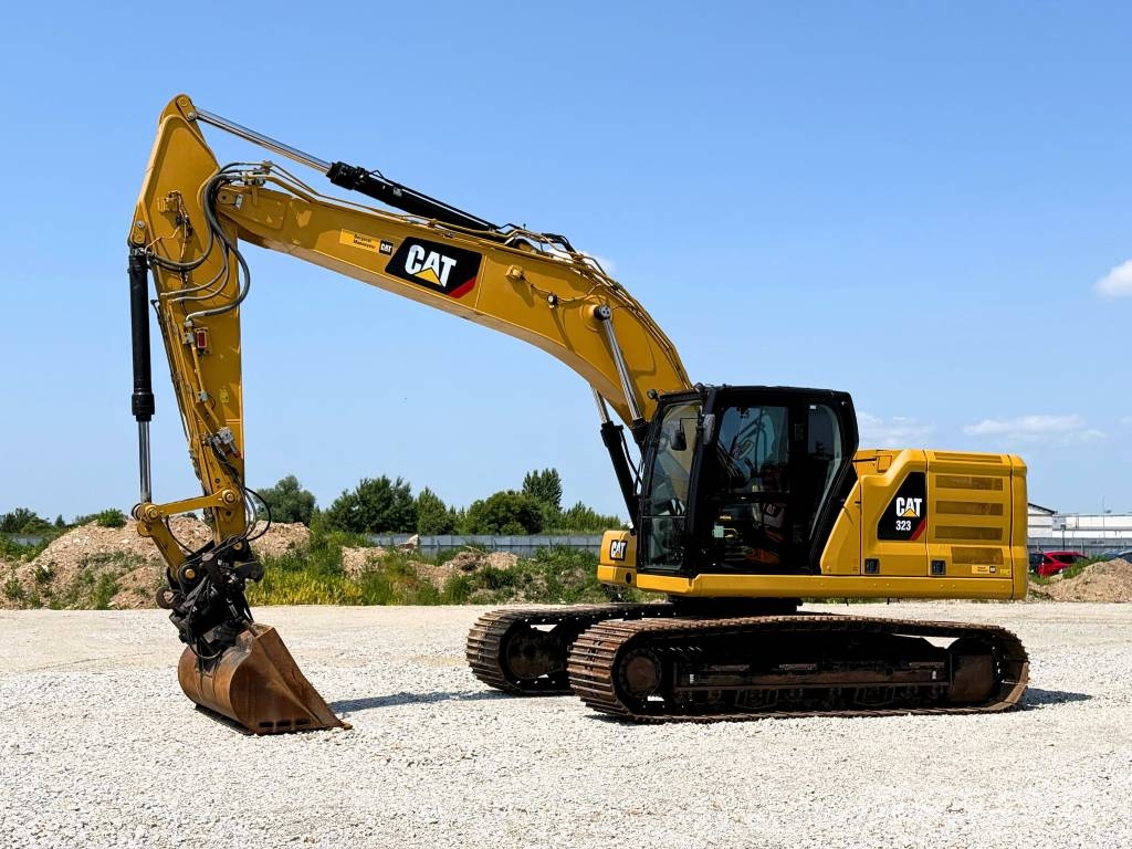CAT 07B CAT 323 Vikšriniai ekskavatoriai