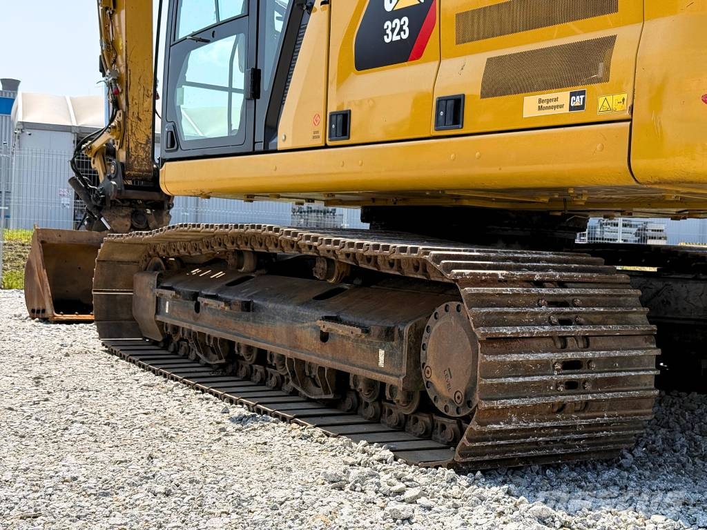 CAT 07B CAT 323 Vikšriniai ekskavatoriai