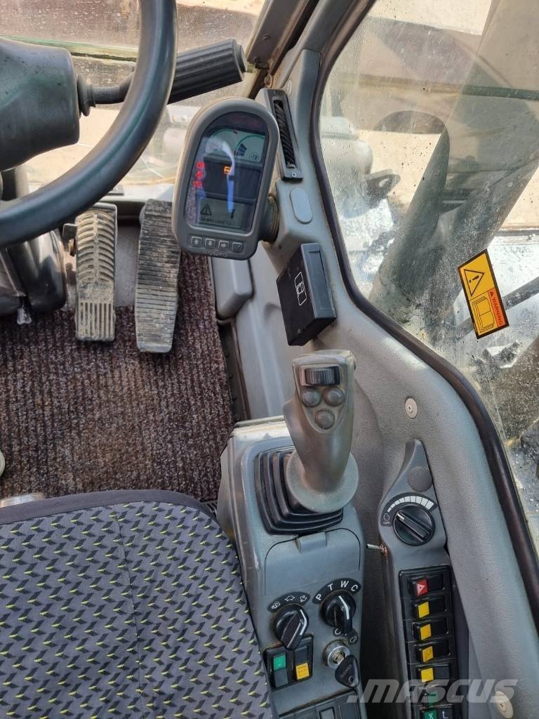 Volvo EW 160 B & Roto Колёсные экскаваторы