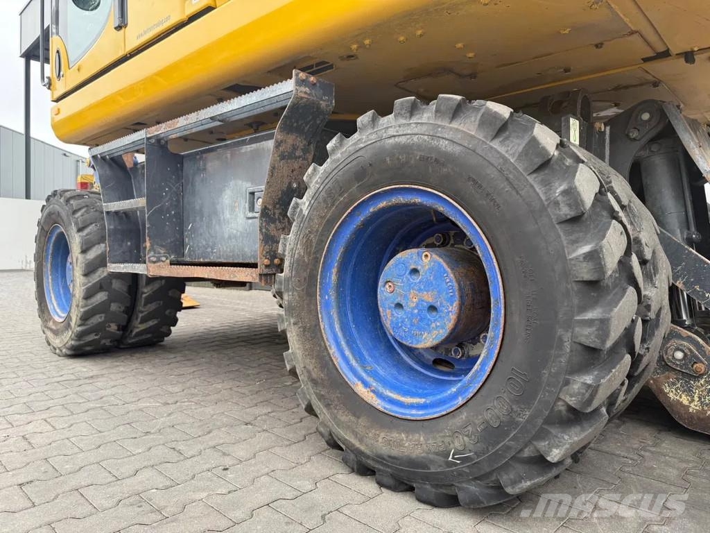 Komatsu PW160-10 حفارات بعجل