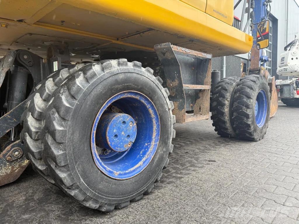 Komatsu PW160-10 حفارات بعجل