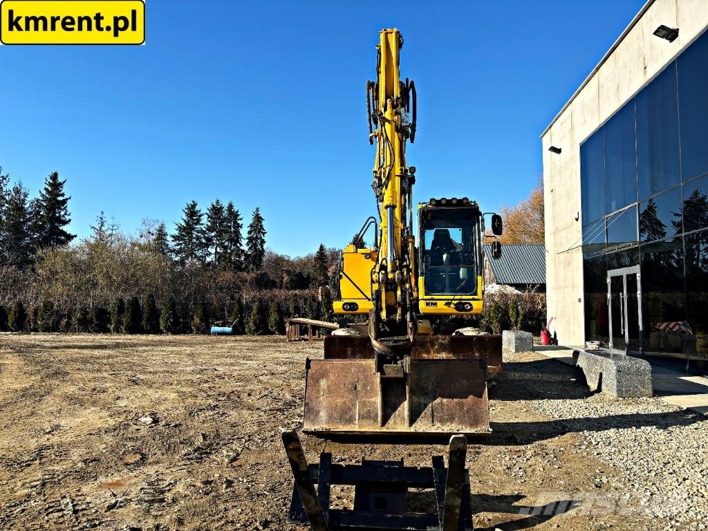 Komatsu PW 148-10 حفارات بعجل