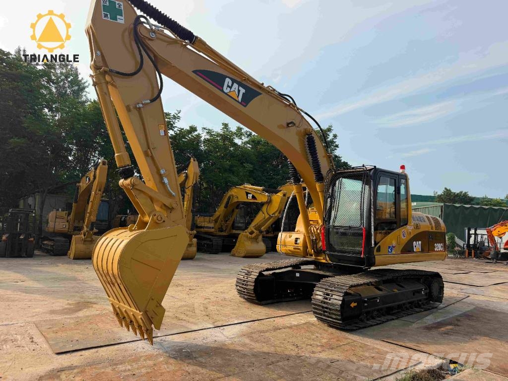 CAT 320 C Гусеничні екскаватори