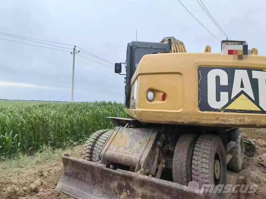 CAT M320D Wielgraafmachines