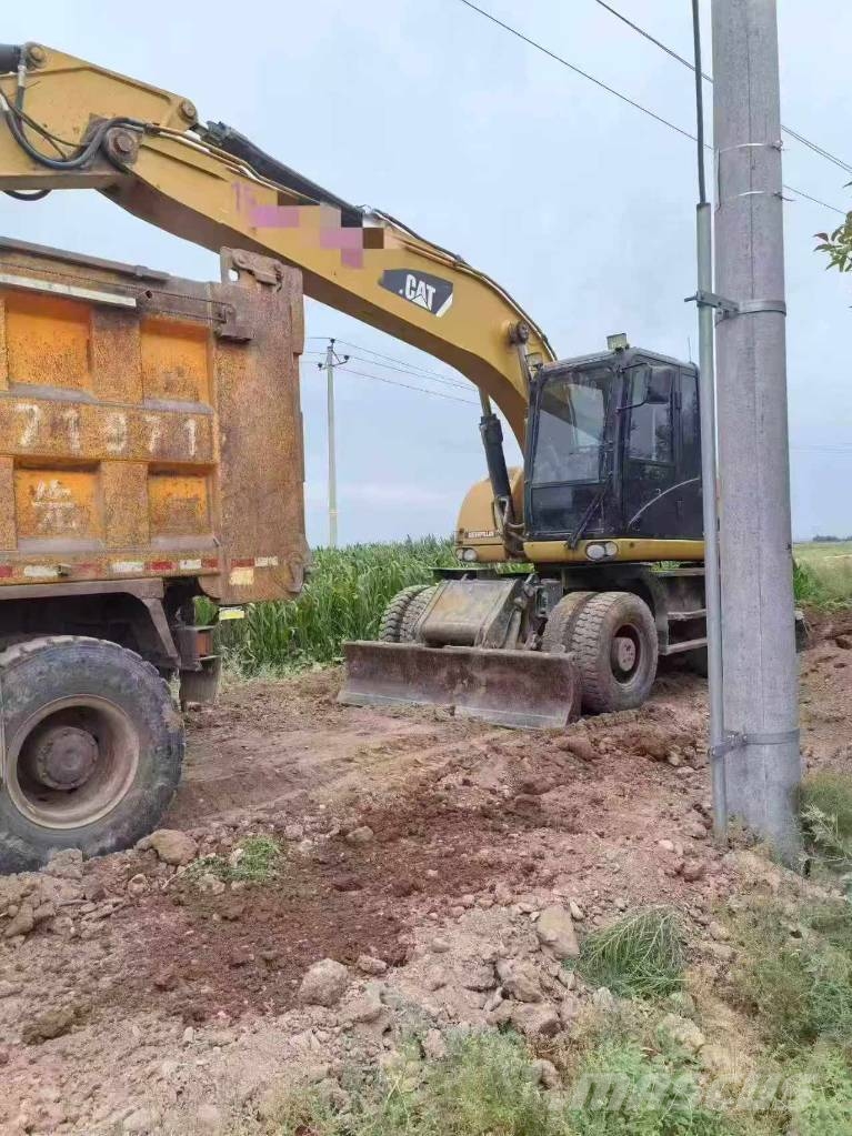 CAT M320D Wielgraafmachines