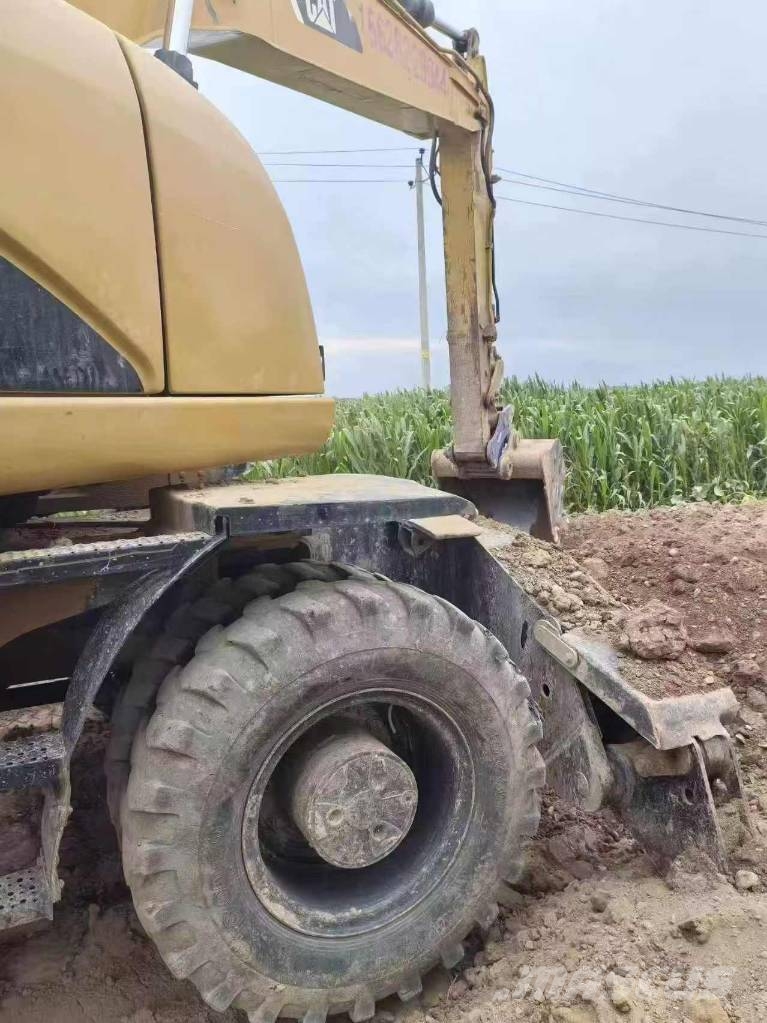 CAT M320D Wielgraafmachines